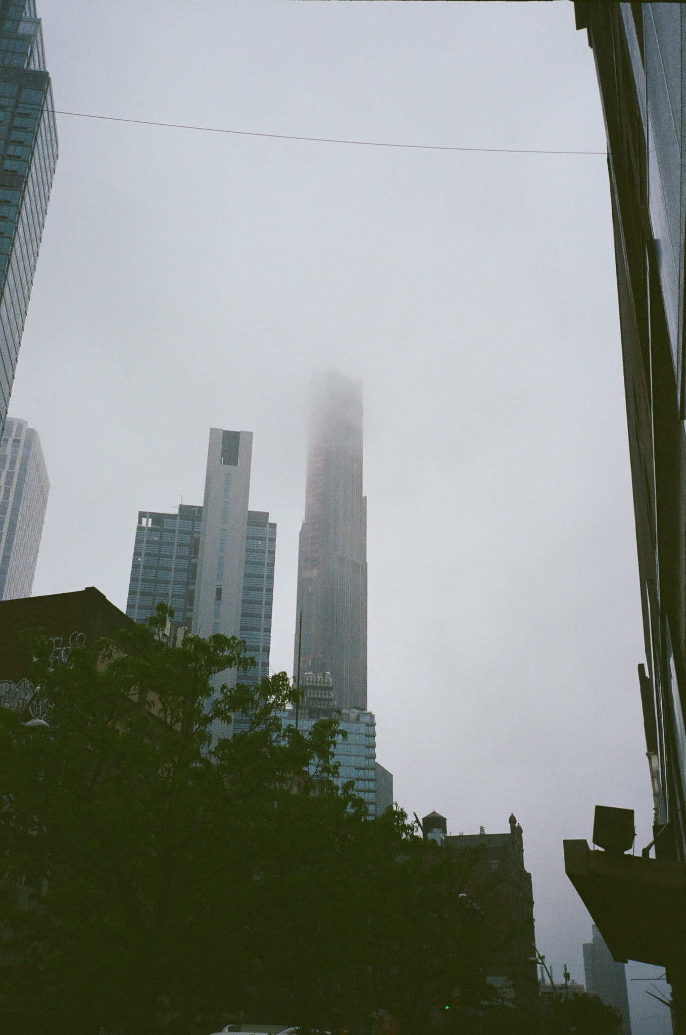 The Brooklyn Tower shrouded by fog early in the morning on a foggy day.