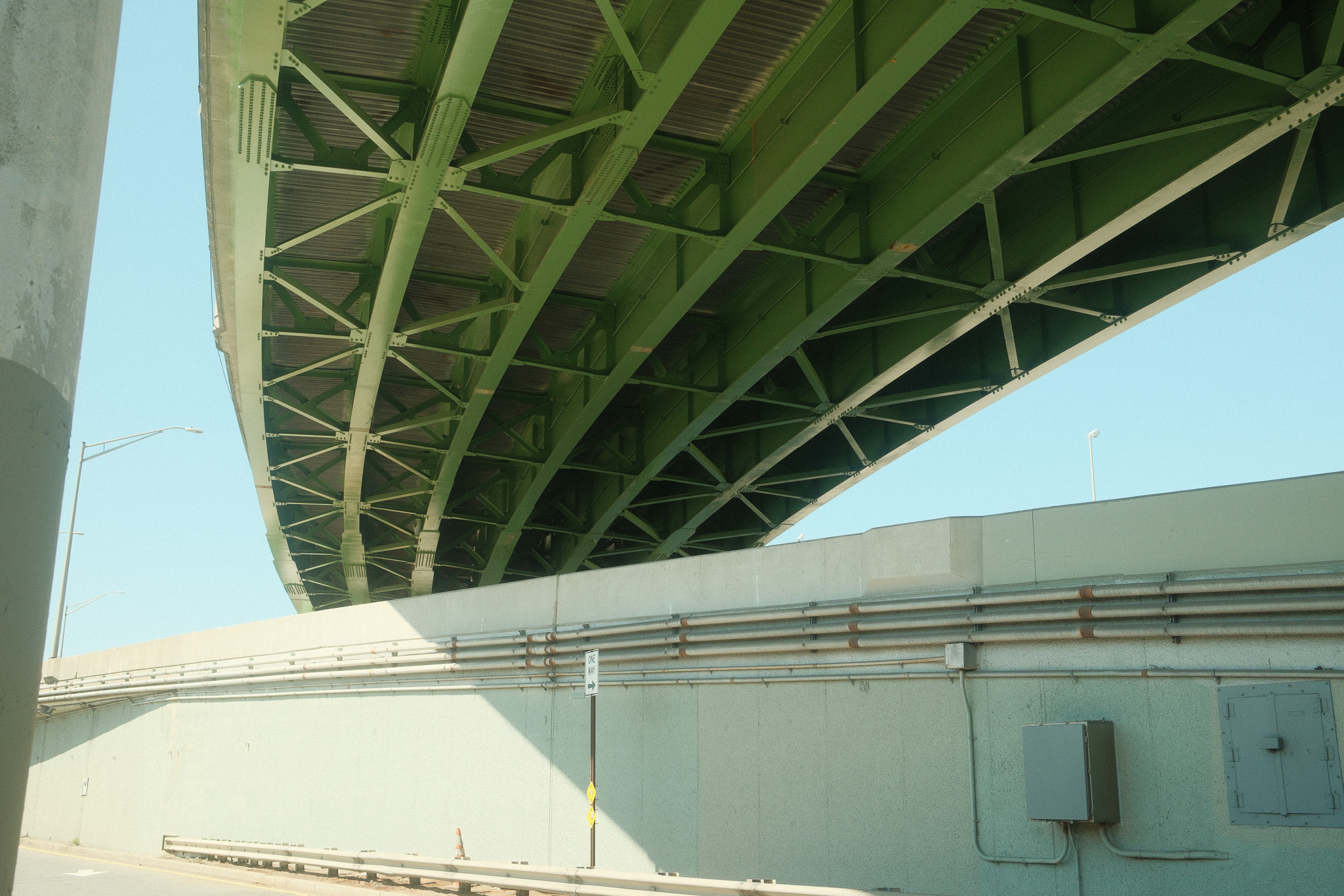 Underneath a highway overpass.