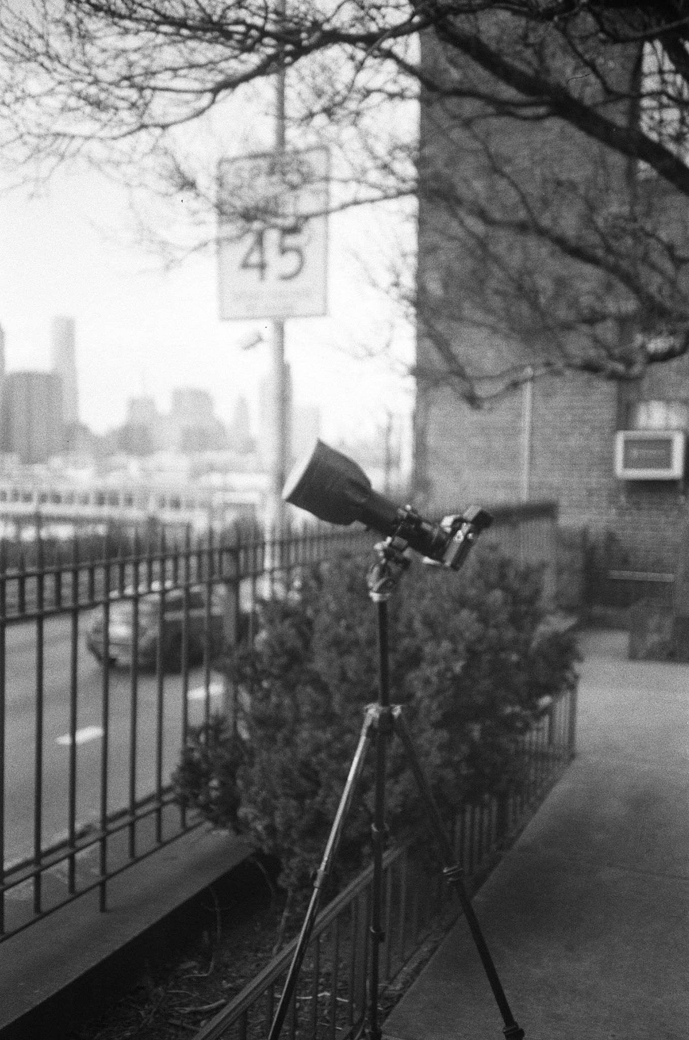 Canon F-1 with a giant lens on a tripod