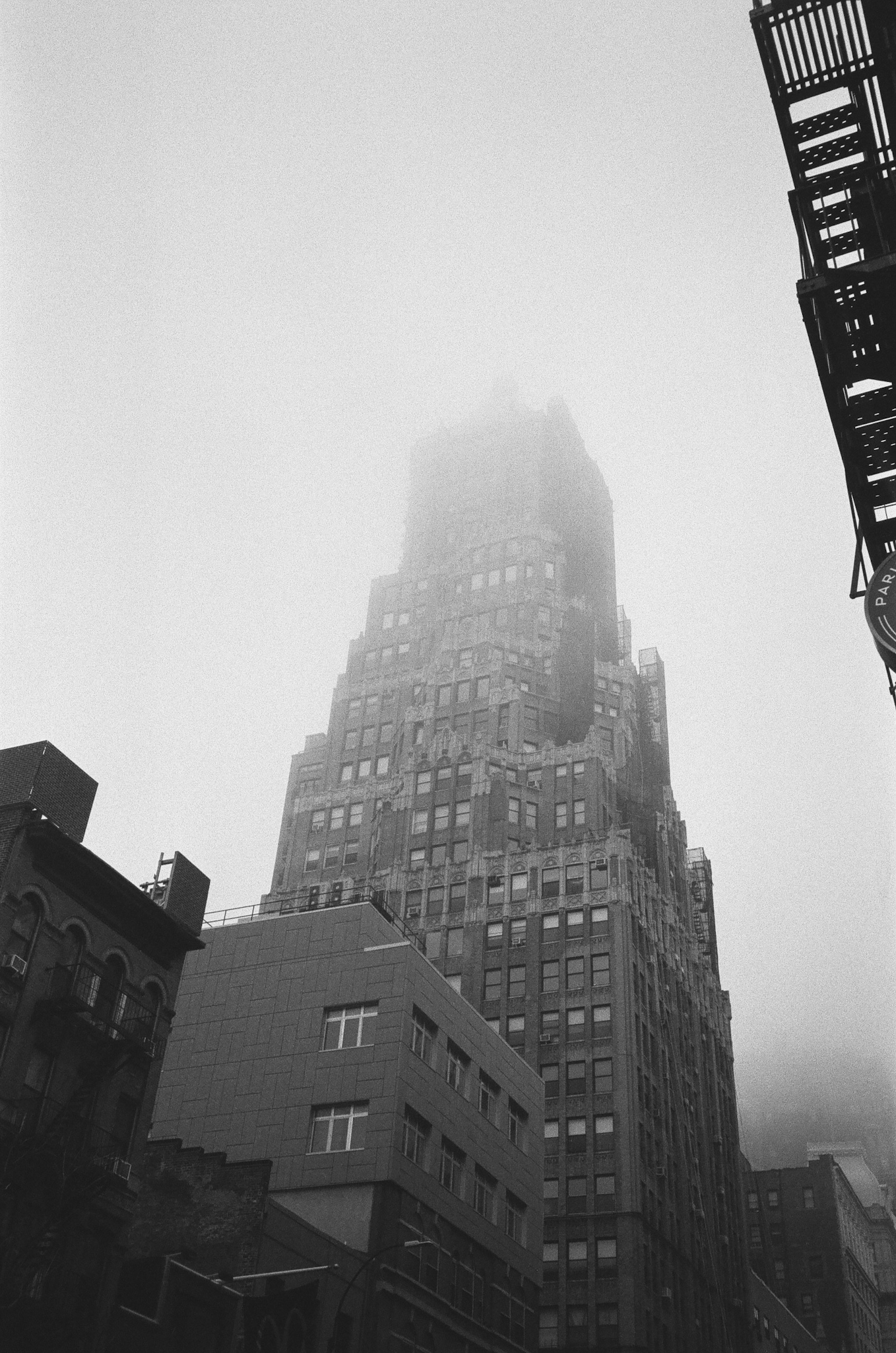 Tall building lost in the fog in Brooklyn