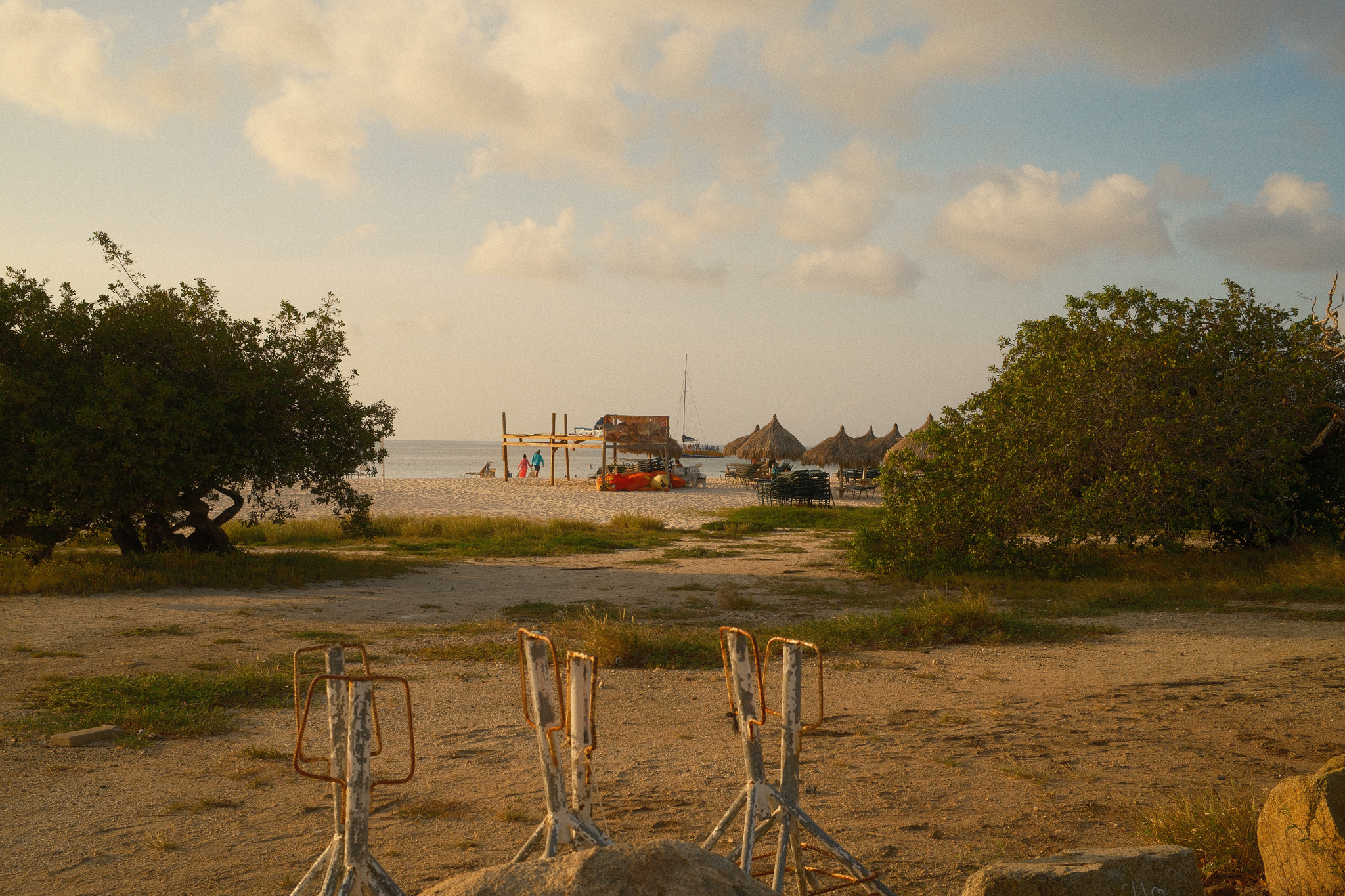 Some straw-covered cabanas at a resort in Aruba