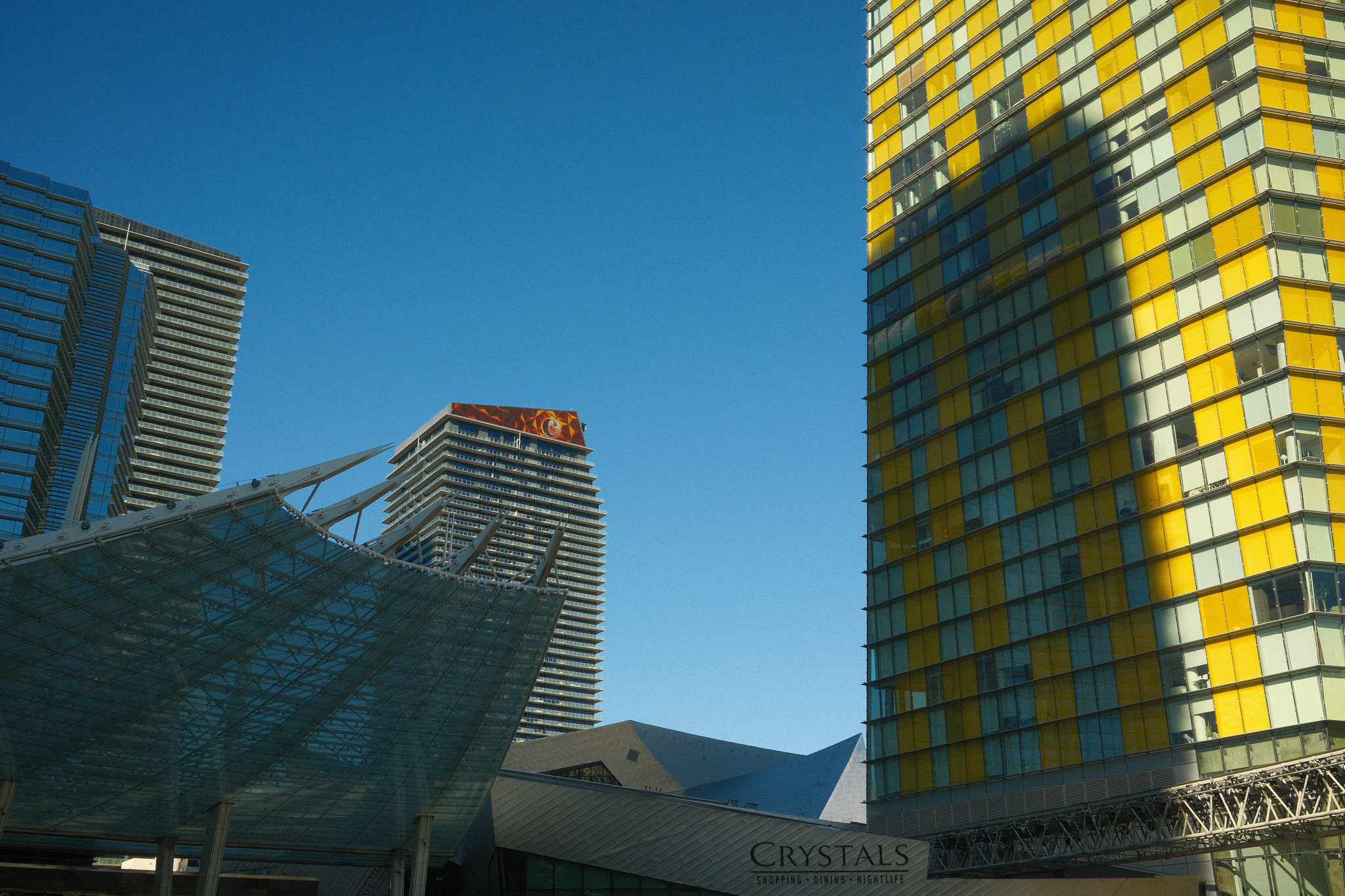 A few tall buildings above the Crystals mall in vegas