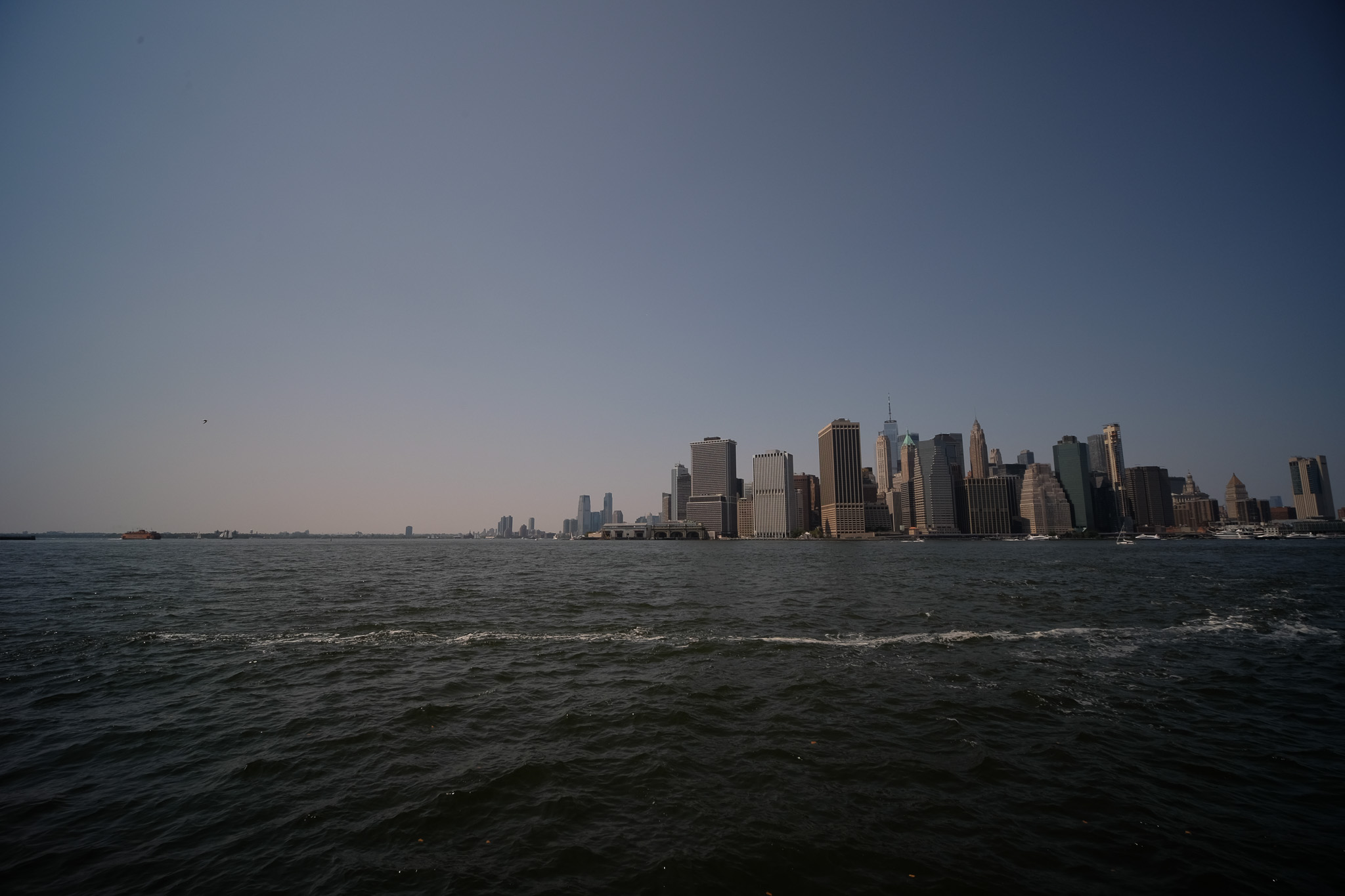 All the tall buildings in lower manhattan as seen from across the east river.