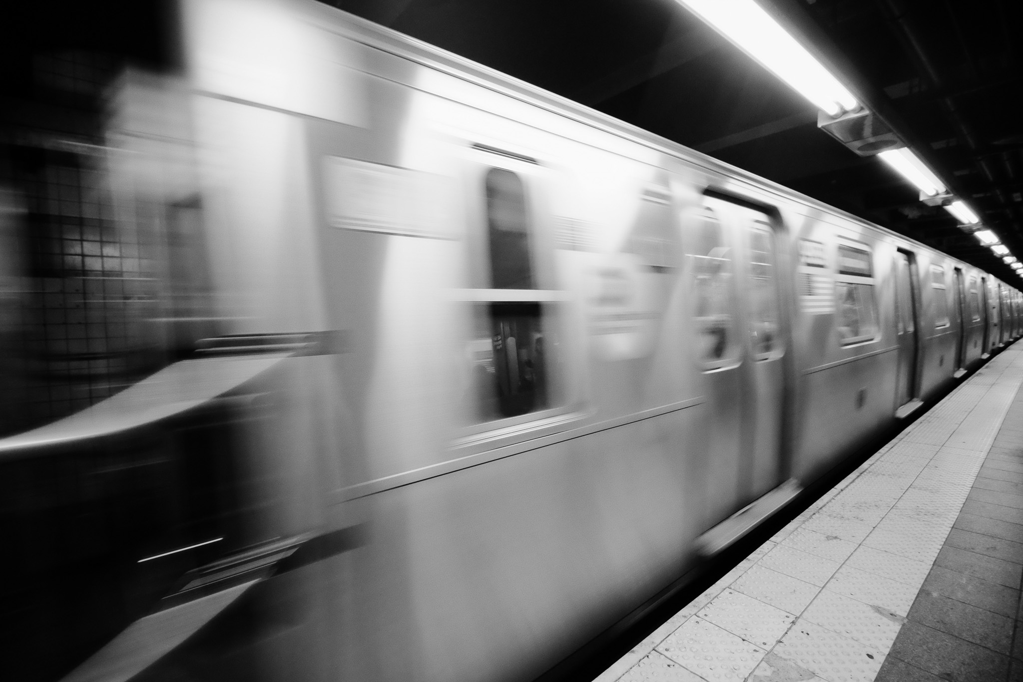 An NYC MTA M train entering the station